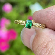 Orange blossom emerald ring