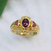 Garnet & Sunstone ring in granulated 18K gold