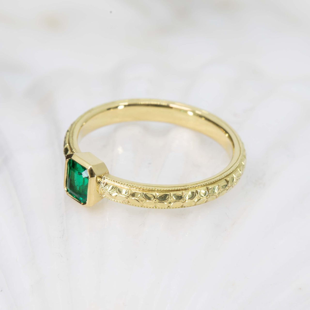 Orange blossom emerald ring