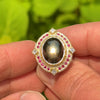 Black Star Sapphire Ring in granulated 18K gold